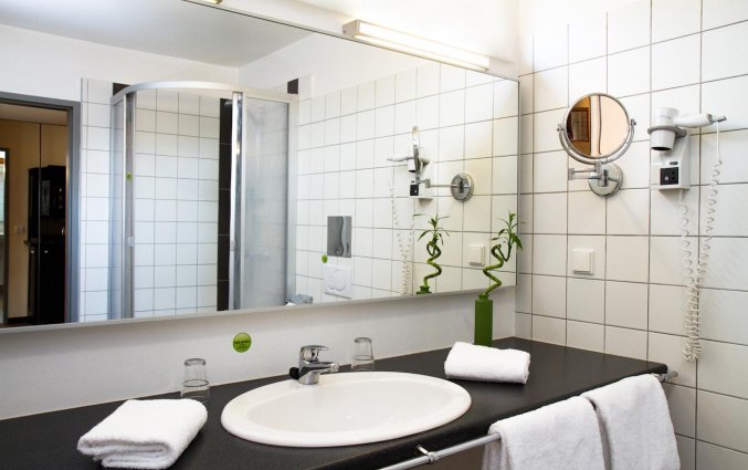 Badkamer in standaard kamer van hotel Boutique Stadthalle in Wenen
