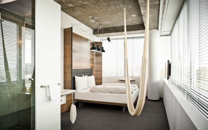 Kamer met hangmat in Hotel Daniel Vienna in Wenen