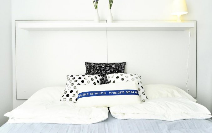 Bed van een appartement van appartementen Happy Tower Krakow in Krakau