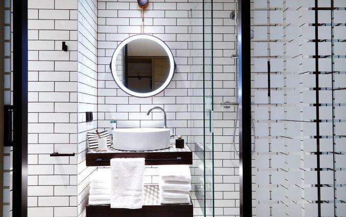 Badkamer van een tweepersoonskamer van Hotel Puro Gdansk Stare Miasto in Gdansk