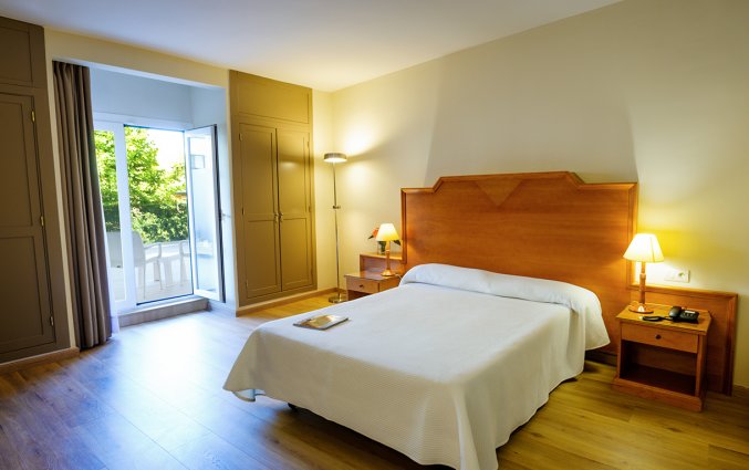 Slaapkamer in Hotel Monarque El Rodeo in de Costa del Sol