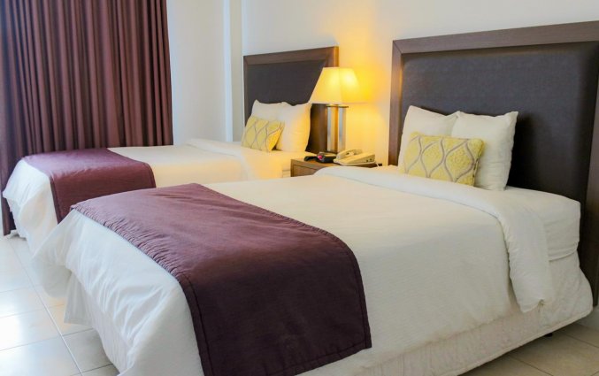 Vierpersoonskamer van collins hotel