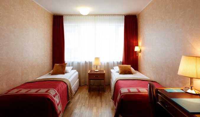 Tweepersoonskamer van hotel Fosshotel Rauoara