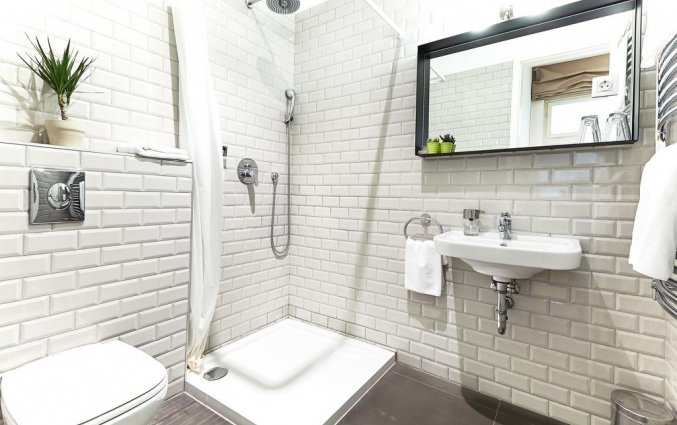 badkamer van Hotel en Apartments The Magazine