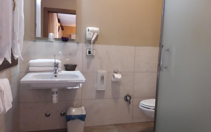 Badkamer van hotel Tinoretto 
