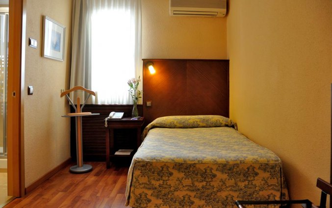 Slaapkamer van hotel Casón Del Tormes in Madrid