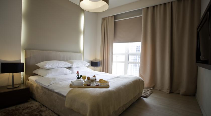 Slaapkamer van Aparthotel Platinum Residence in Warschau