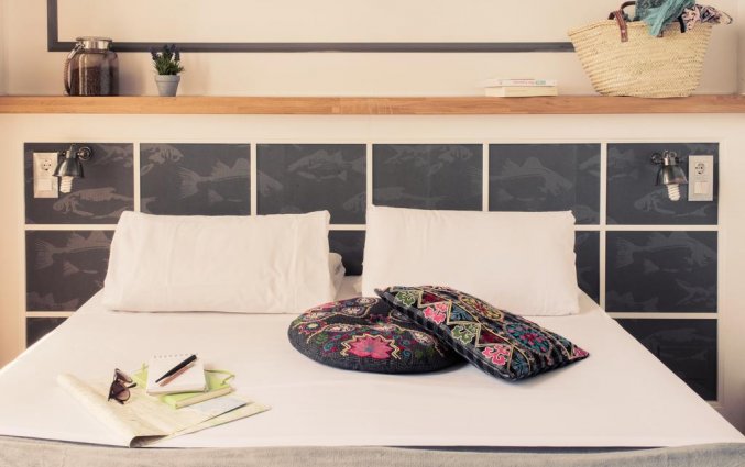 Slaapkamer van hotel Casa Gracia in Barcelona