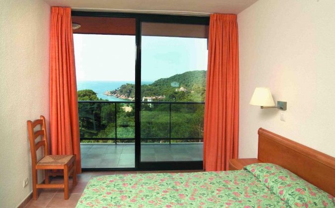 Slaapkamer van Appartementen Albamar in de Costa Brava