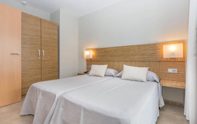 Slaapkamer van Aparthotel Odissea Park
