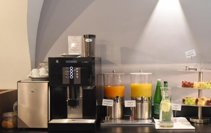 Drankje bij ontbijt van Boutique Hotel Dom in Graz