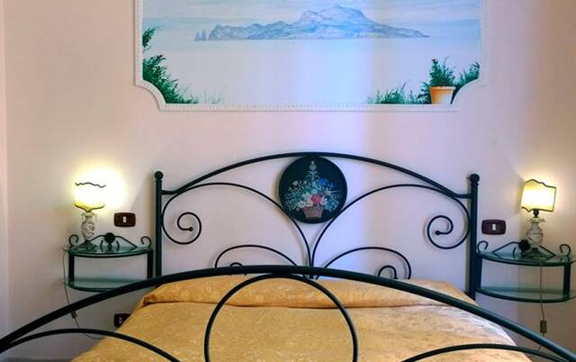 Tweepersoonskamer van Bed & Breakfast Art Suite Principe Umberto in Napels