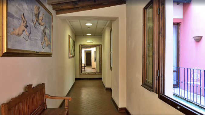 Gangen van hotel Porta Faenza