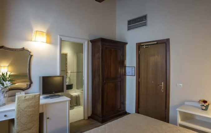 Slaapkamer in Hotel Machiavelli Palace