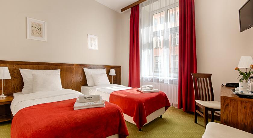 Tweepersoonskamer van aparthotel Yarden in Krakau