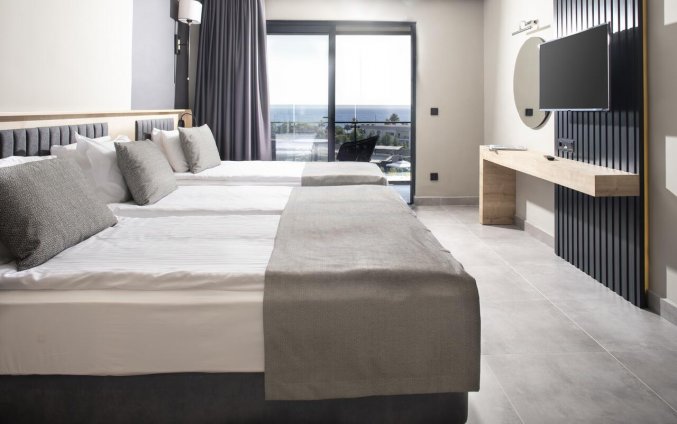 Slaapkamer van Resort Green Garden in Alanya