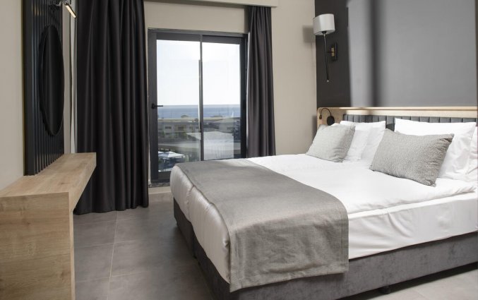 Slaapkamer van Resort Green Garden in Alanya