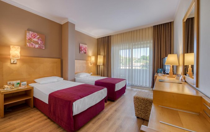 Slaapkamer van Hotel Sealife Buket Beach in Alanya