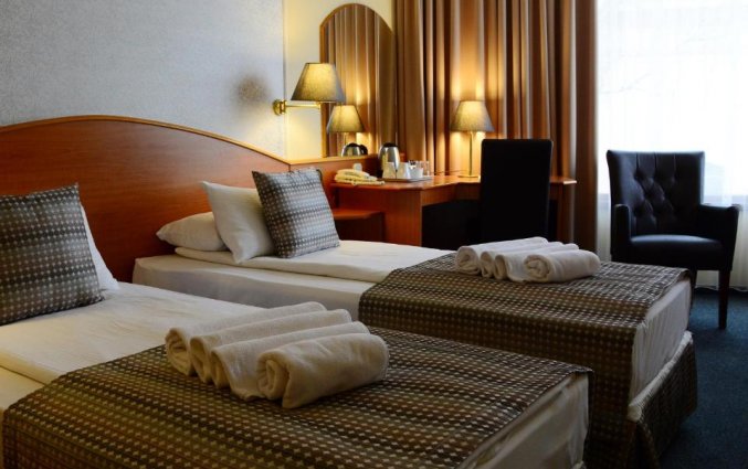Slaapkamer in Hotel Orion Varkert Budapest
