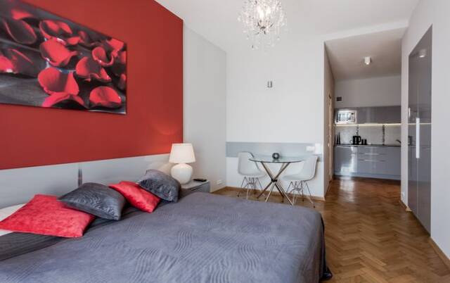 Slaapkamer van een appartement van Appartementen 4Seasons in Krakau