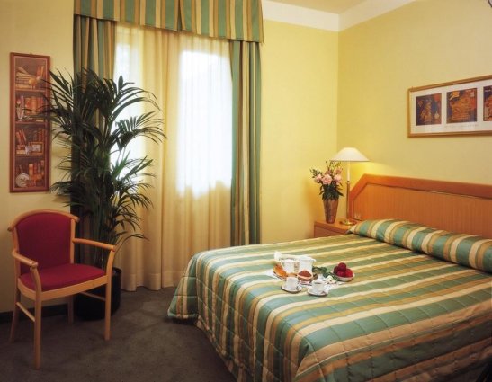 Een tweepersoonskamer van Hotel Qualys Nasco Milaan