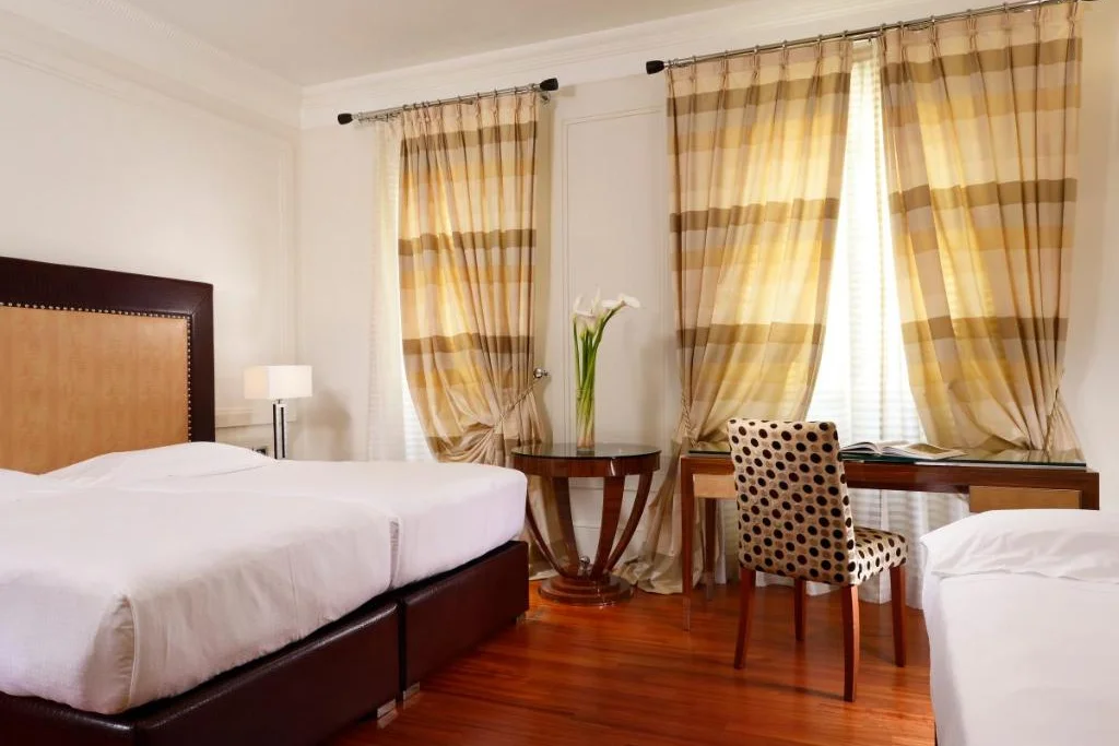 Tripleroom unahotel deco roma