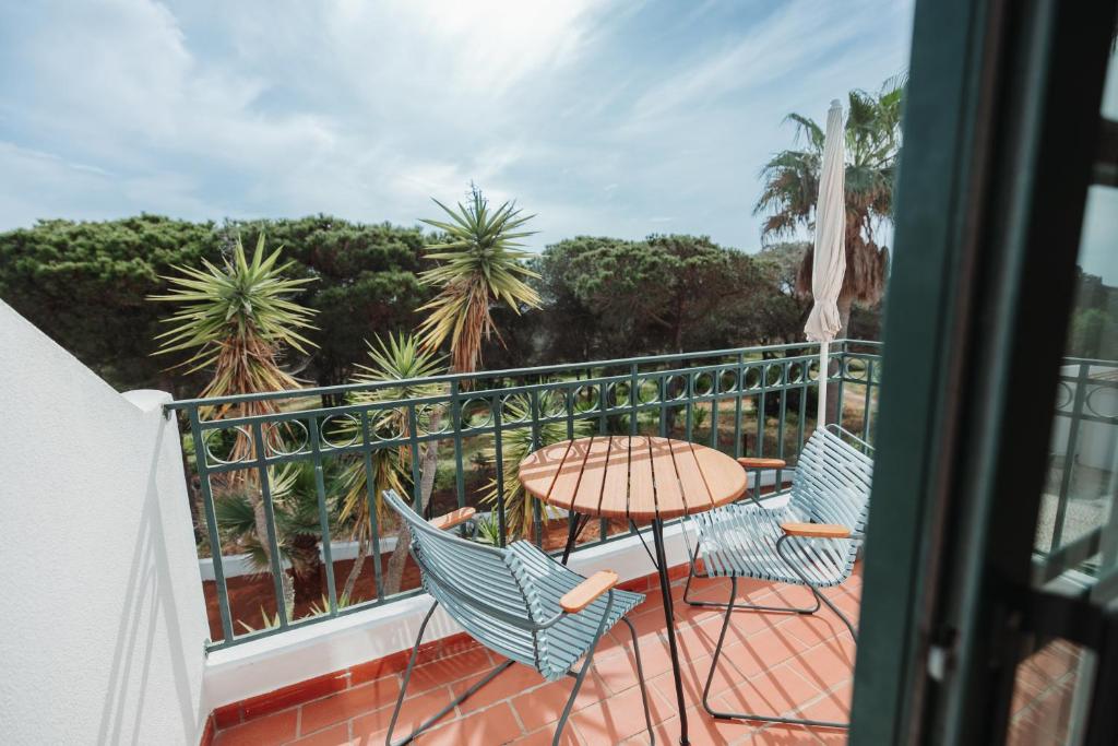 Casa Velha Apartments - balkon met tuinzicht