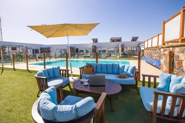 Hotel Boutique Rosario Martin - loungeterras met parasol