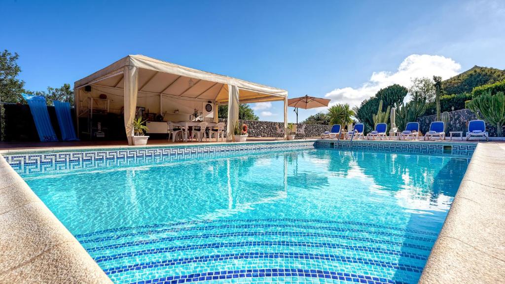 Hotel Rural La Correa del Almendro - zwembad met overdekt terras