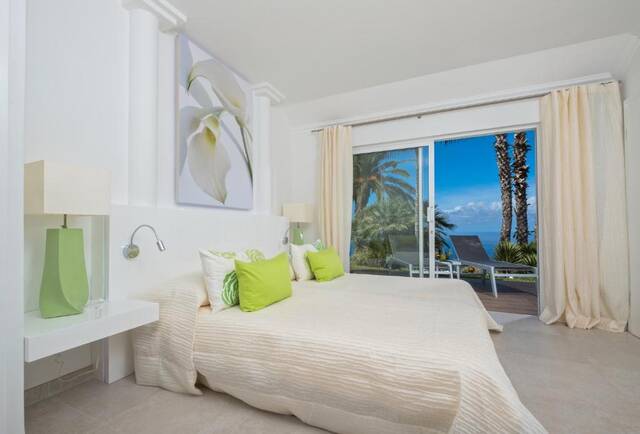 Hotel Jardin de la Paz - slaapkamer met terrasdeur