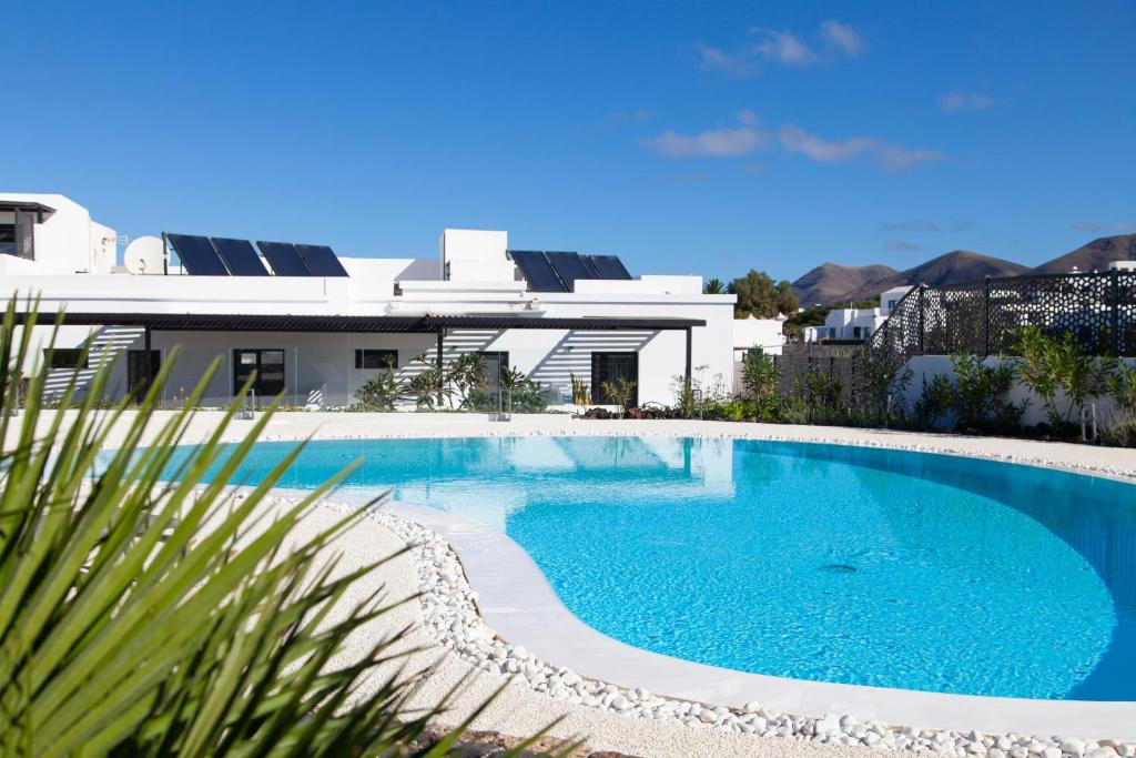 Mana EcoRetreat - zwembad bij de appartementen