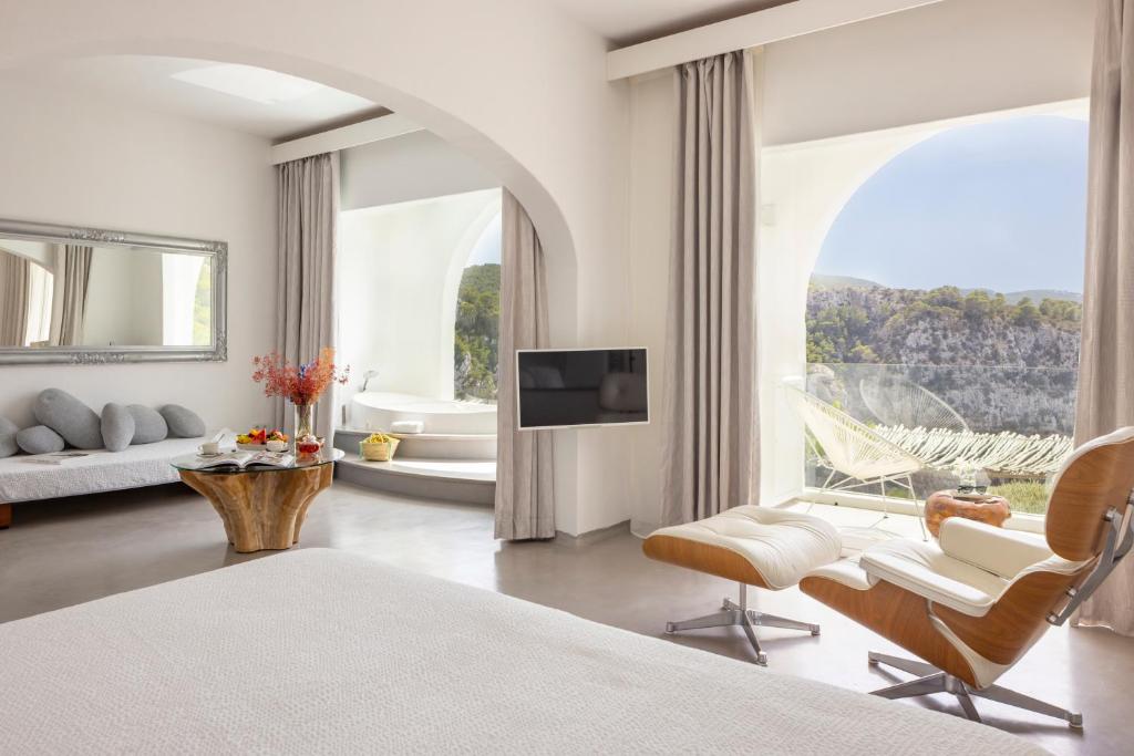 Hacienda Na Xamena - suite met zeezicht en haard