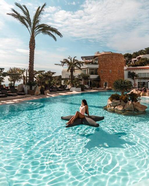 Hacienda Na Xamena - zwembad met palmen