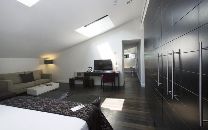 Slaapkamer van hotel Hospes Palau de La Mar in Valencia