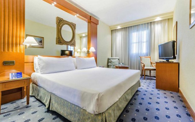 Slaapkamer van hotel Sevilla Macarena in Sevilla