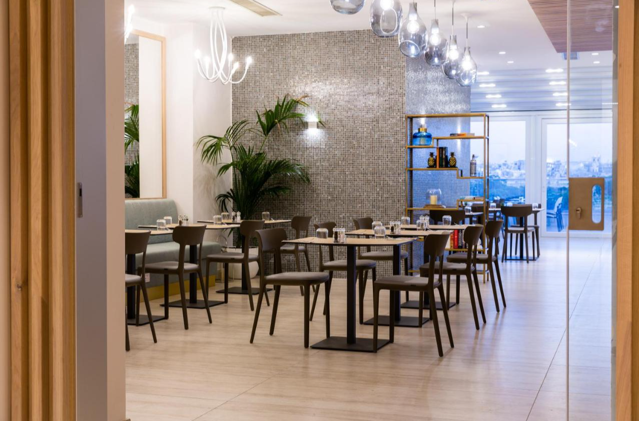 Restaurant van Hotel & Suites 115 The Strand Malta